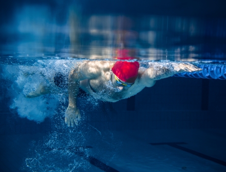 Athlete swimming in pool